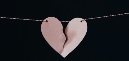 broken heart hanging on wire